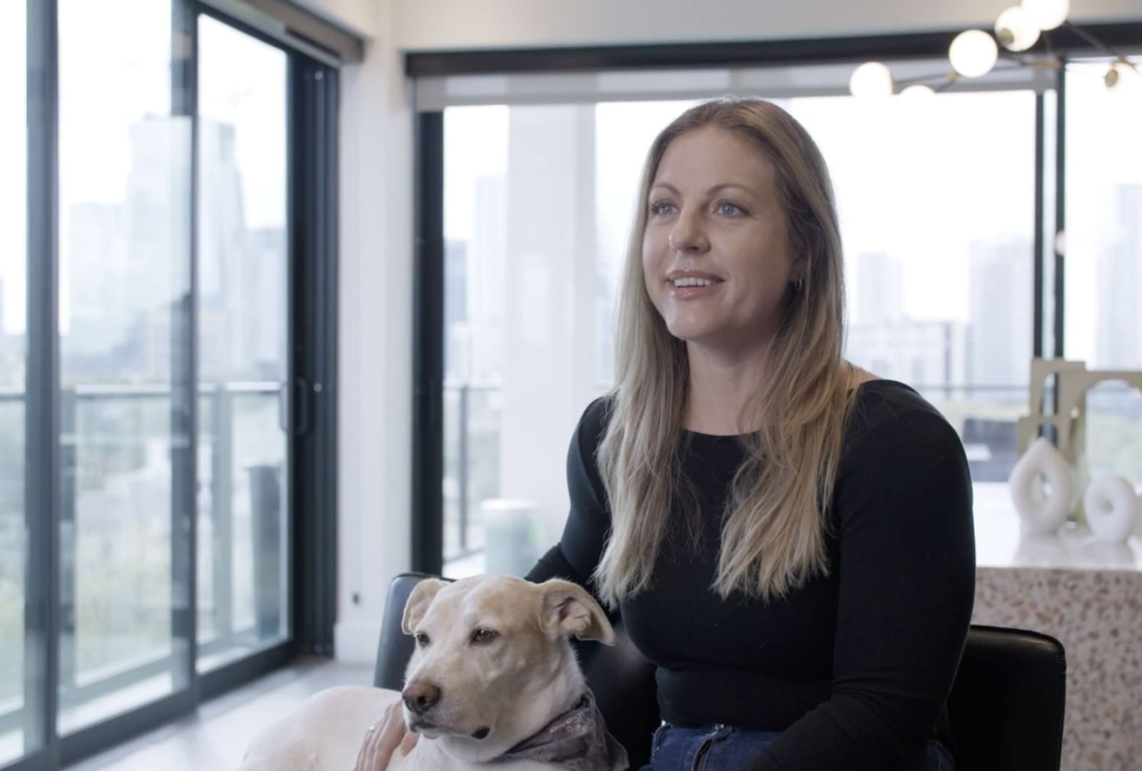 a woman and a dog
